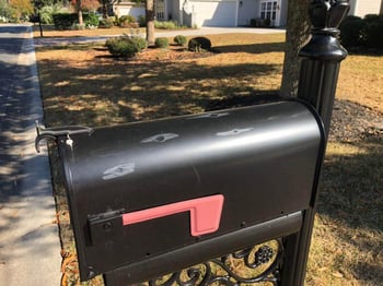 Mailbox with hail damage