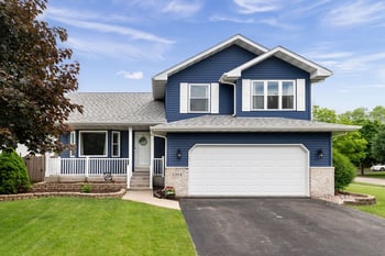 Asphalt shingle roof of a two story home