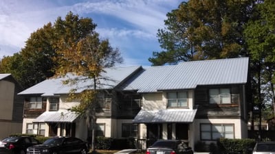 Commercial multi-family building with a galvalume screw-down metal roof