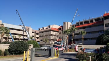 Metal roof replacement on a 4-story commercial building 