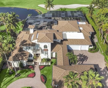 An ariel shot of a compound with Decra metal roofing