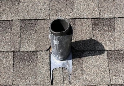 Damaged lead pipe boot from an animal