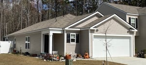 Gable style home with a 3 tab asphalt shingle roof