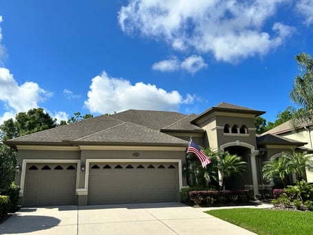 Stucco home with GAF weather wood shingles