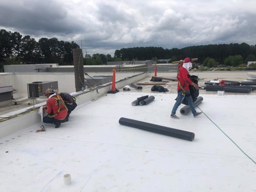 RC crew installing commercial flat roof