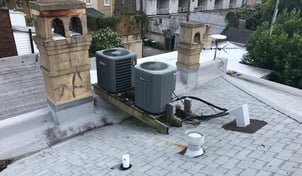 AC units on a roof and poor roof ventilation