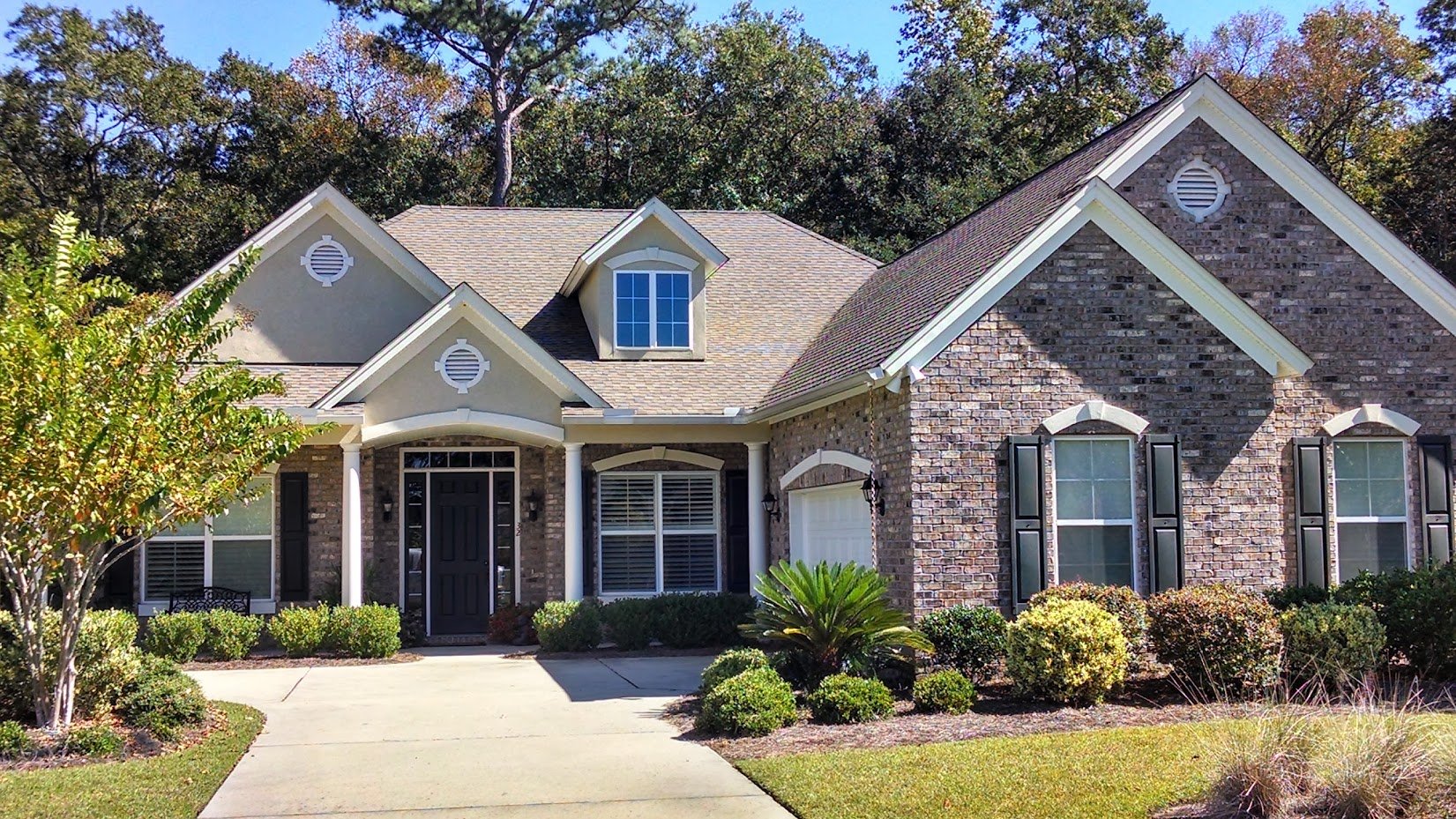 asphalt shingle roof brick home-1