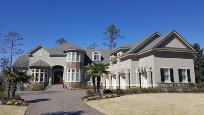 beautiful new roof on a large home