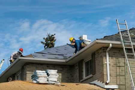 roofcrafters repairing a leak