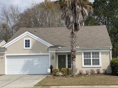 brown architectural shingle roof on a ranch style home