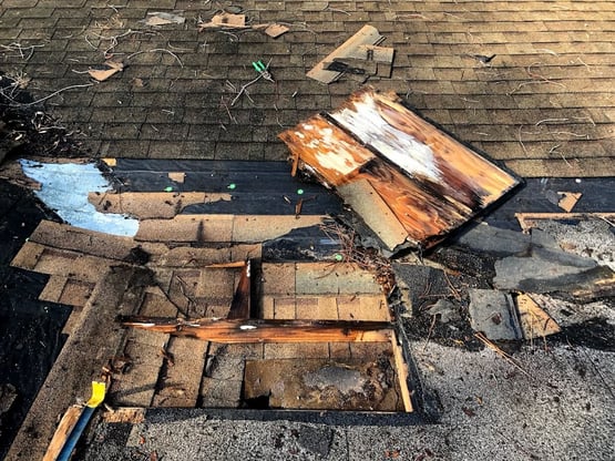 rotten plywood damage at a valley transition of a roof