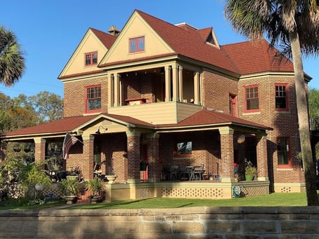 two story home with complex roof-4