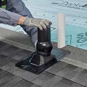 GAF master flow pivot pipe boot flashing being installed