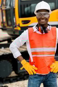 Operator working with a machine at a construction site
