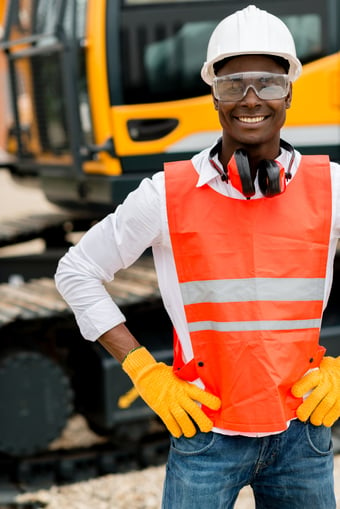 Supervisor working with a machine at a construction site