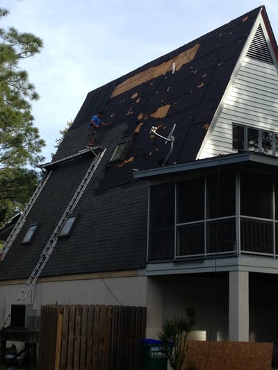 Steep roof replacement in progress