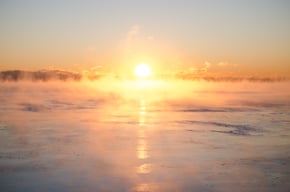 Summer sun over the water