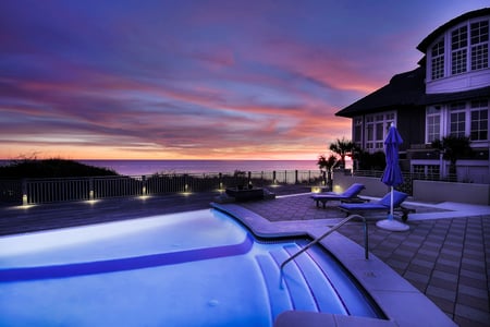 backyard pool at sunset