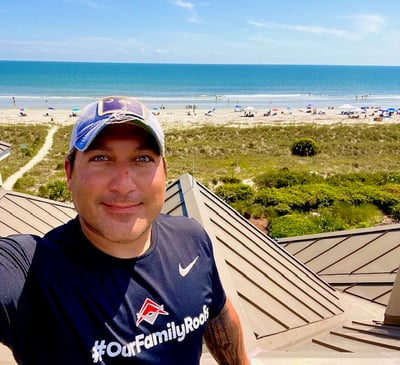 roofer on a beachfront roof