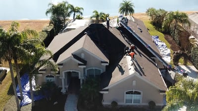 Birdseye view of a shingle roof replacement in progress