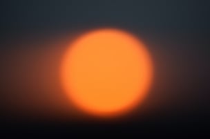 sun setting in sky
