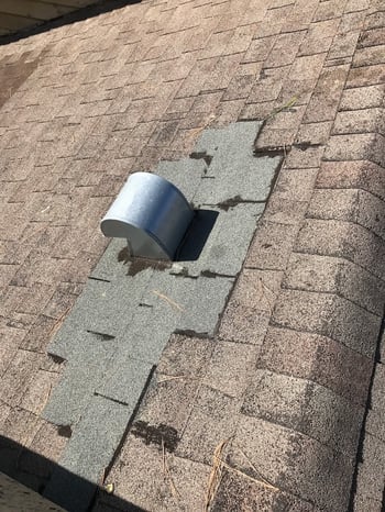 damaged shingles around vent