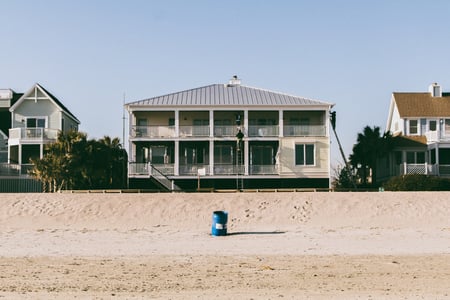 house on beach with metal roof