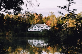 autumn home overlooking water