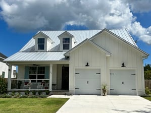 galvalume standing seam on home with board and batten siding