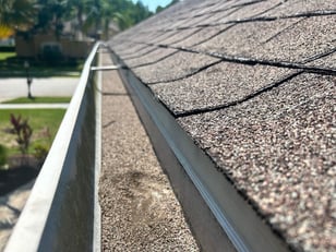 granule loss in a gutter after a hailstorm