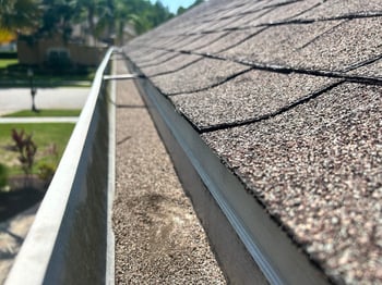 granule loss in a gutter after a hailstorm