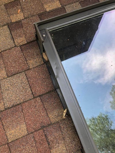 Velux skylight with hail damage