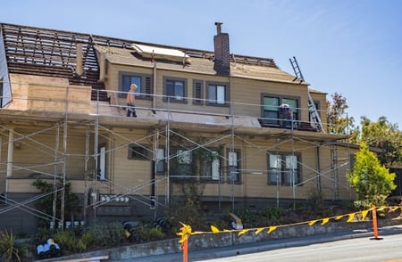 house undergoing roof replacement