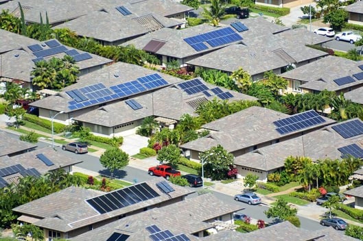 solar panels on roof in neighborhood