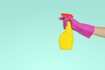 spraying cleaning solution