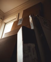 items being boxed in order to move