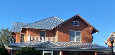 metal roof on brick home-1