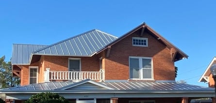 metal roof on brick home-2