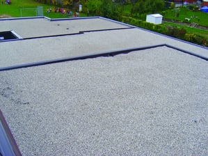 mod-bit flat roof over a porch