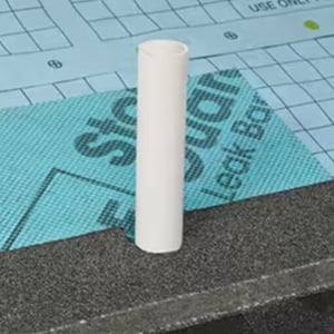 PVC plumbing pipe detail on a GAF warranty roof system