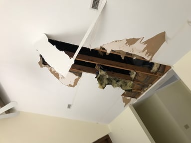 severe ceiling damage from roof leak