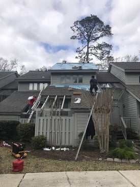 roof tear off in progress