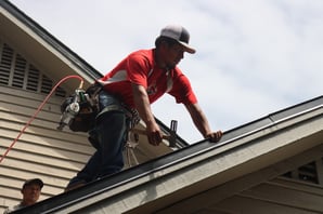 RoofCrafters roofer doing a roof installation along a rake edge