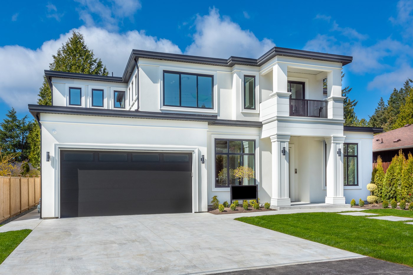 Two story home with flat slope roof