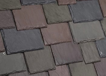 up close shot of a multi-colored synthetic slate tile roof 
