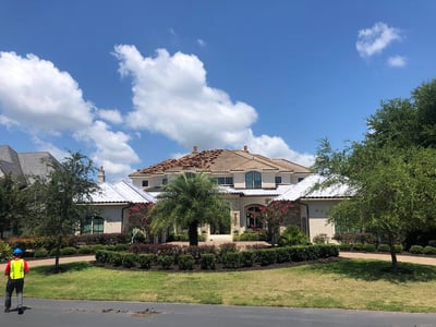 tile roof home undergoing roof replacement