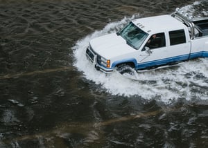 truck stuck in torrential waters
