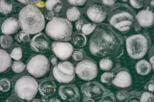balls of hail melting
