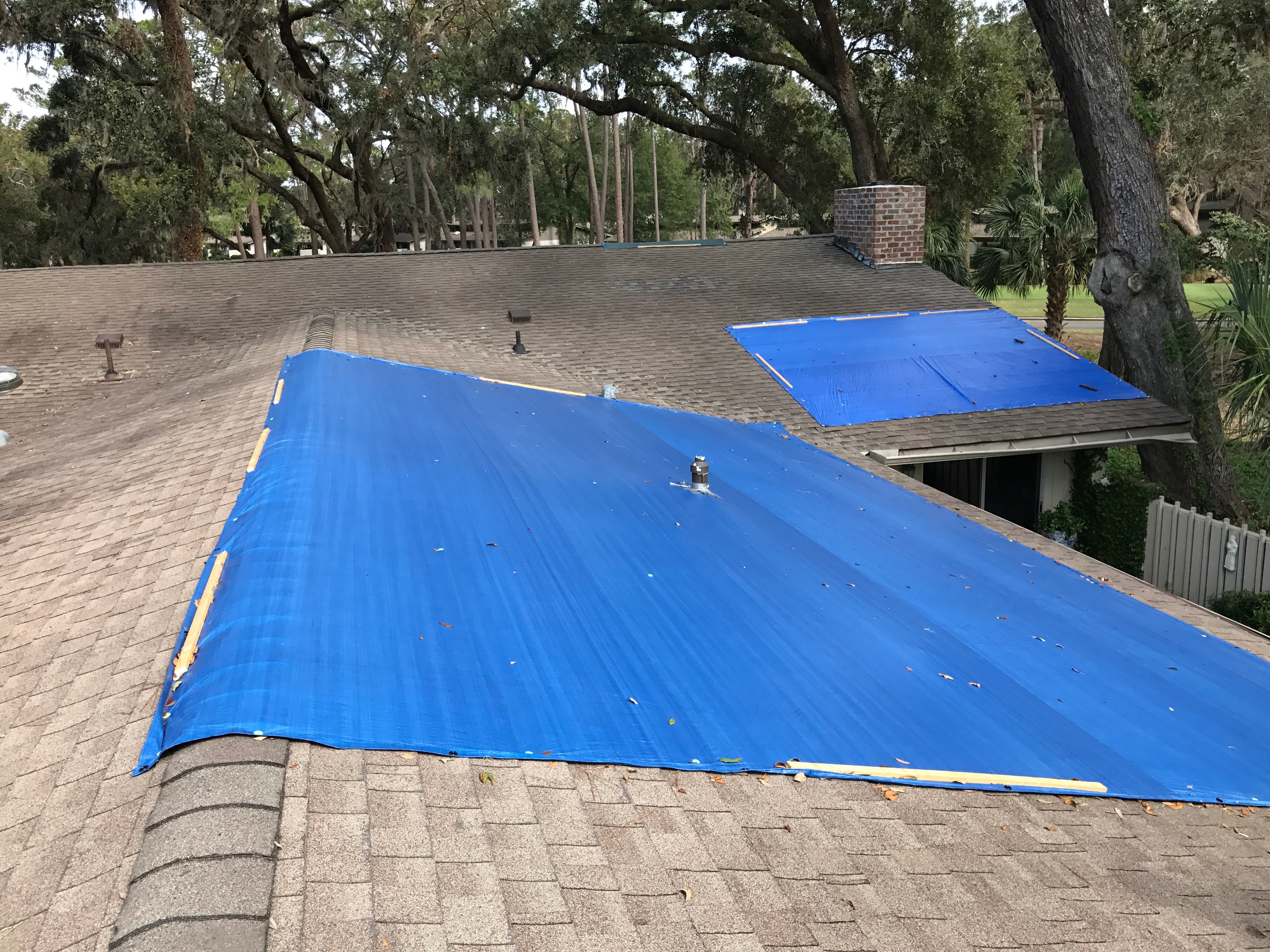 tarps on leaking roof