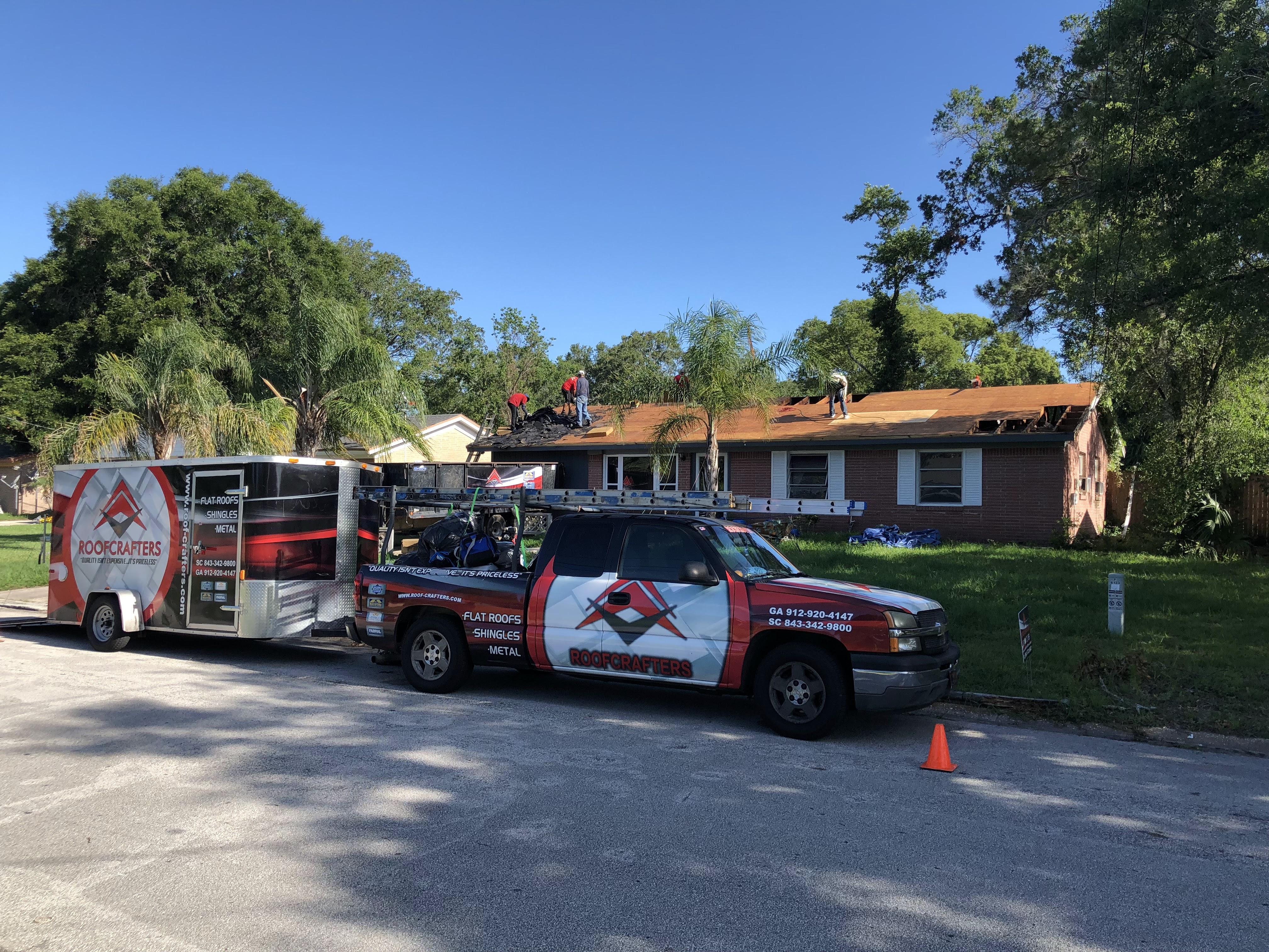 roofcrafters truck in front of home